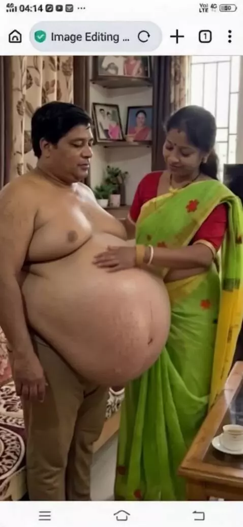 AI Video from prompt: Create a video where this lady is rubbing her bo