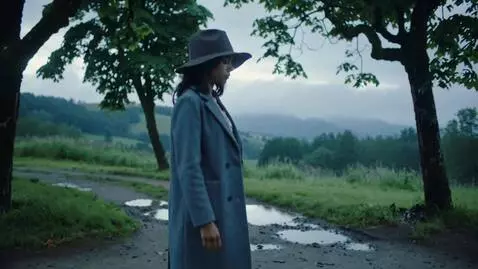AI Video from prompt: A moving girl. Add an animation of a slow rain f