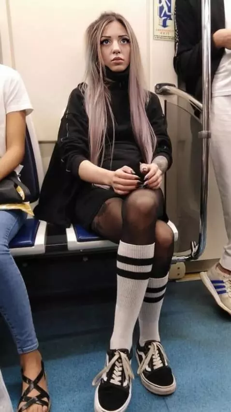AI Video from prompt: A girl is riding the subway, swaying as she goes