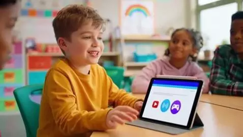 AI Video from prompt: "A cute 8-year-old boy sitting in a colorful cla