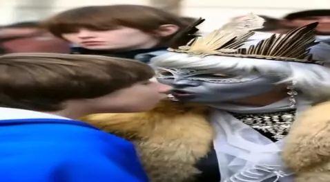 AI Video from prompt: A charming fifty-year-old snow queen and a young