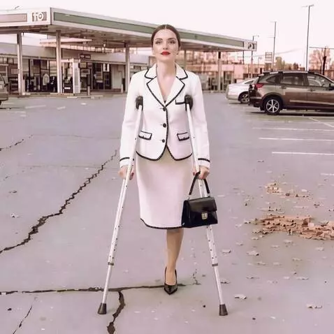 AI Video from prompt: A very beautiful one-legged woman on crutches st