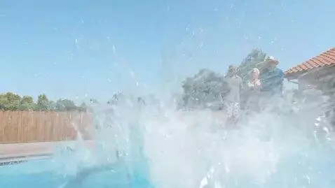 AI Video from prompt: Man and his goons jump into the empty pool with 