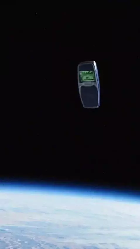 AI Video from prompt: A man (an astronaut) throws this phone from spac