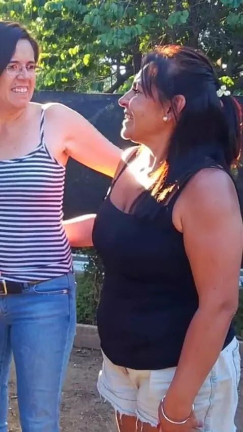 AI Video from prompt: The woman with glasses leaves this woman and hug
