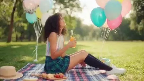 AI Video from prompt: Make a video of a woman in a school skirt and bi
