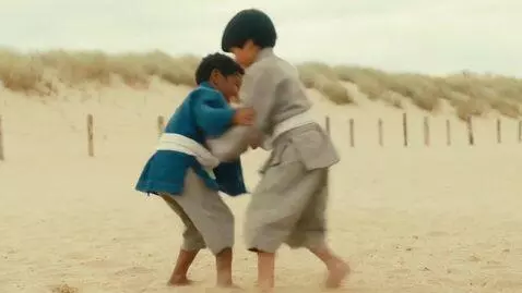 AI Video from prompt: two boys at six years,wearing kurashi jackets,wh