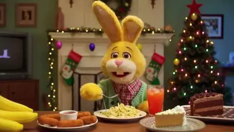 AI Video from prompt: Realistic Yellow Bunny Puppet Eating a Plate Of 