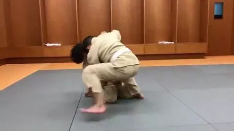 AI Video from prompt: two boys at six years,wearing tan judo jackets,w