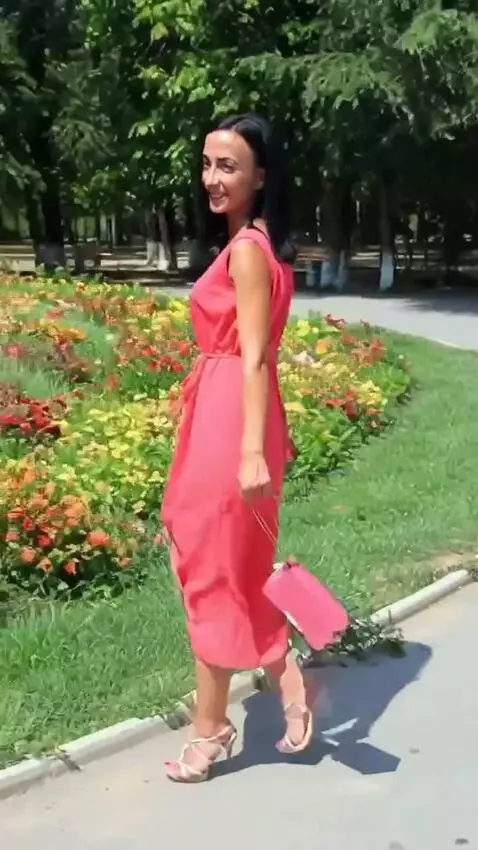 AI Video from prompt: The girl takes off her dress, there is a beautif