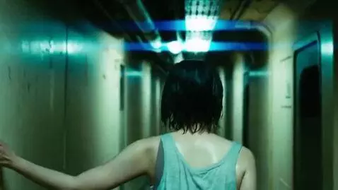 AI Video from prompt: A rear view tracking shot following a young Japa