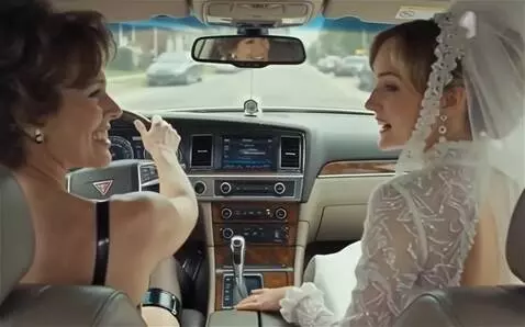 AI Video from prompt: Both wives are driving  in the wedding Cadillac,
