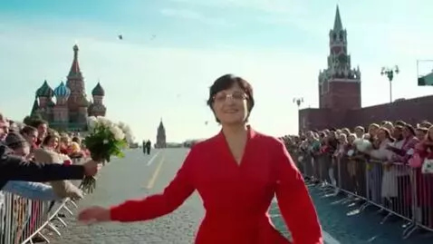 AI Video from prompt: Use the woman in the photo. She's wearing a beau