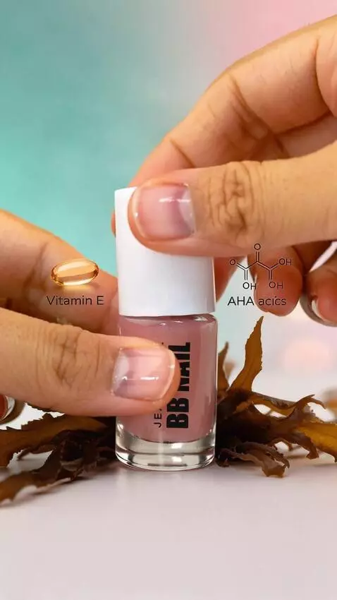 AI Video from prompt: The hand takes the nail polish, opens the bottle