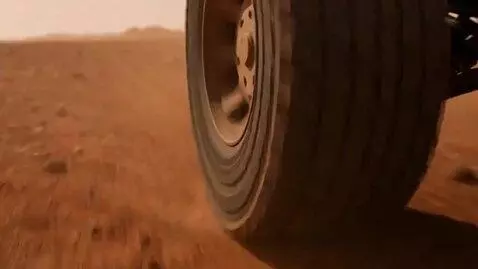 AI Video from prompt: "A rover is driving across the surface of Mars."