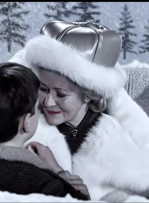 AI Video from prompt: an elderly seventy-year-old snow queen with a sn