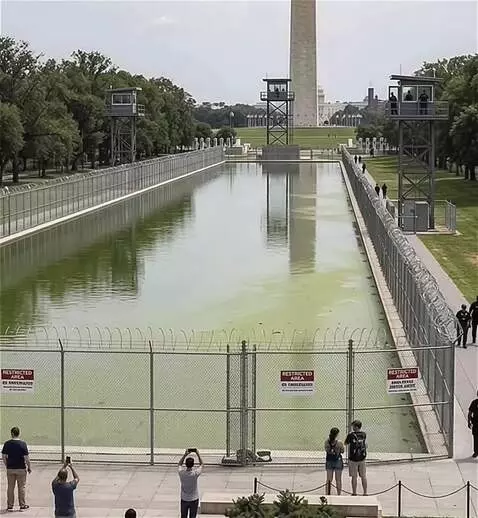 AI Video from prompt: Fencing company but up barricades. The national 