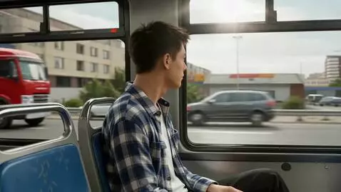 AI Video from prompt: A young man with black hair, wearing a blue plai