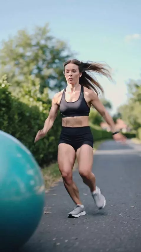 AI Video from prompt: A 25-year-old girl is running along the roads an