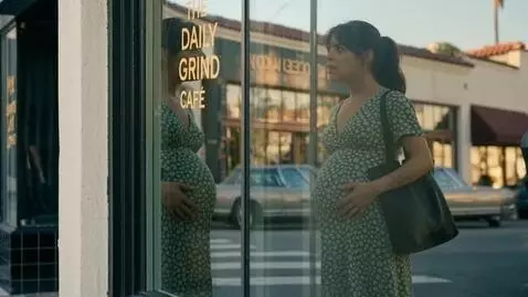 AI Video from prompt: An American woman looks at herself in a window r