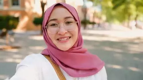 AI Video from prompt: make a video from this photo wearing only a biki
