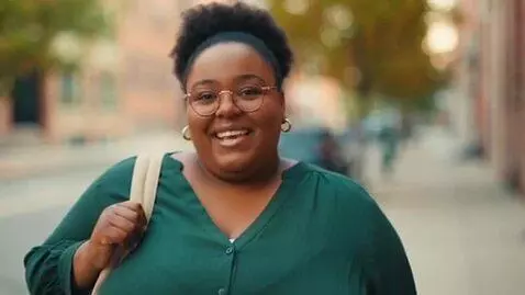 AI Video from prompt: A fat woman with large breasts