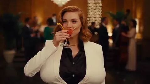 AI Video from prompt: a fancy woman in a suit at a party. she takes a 