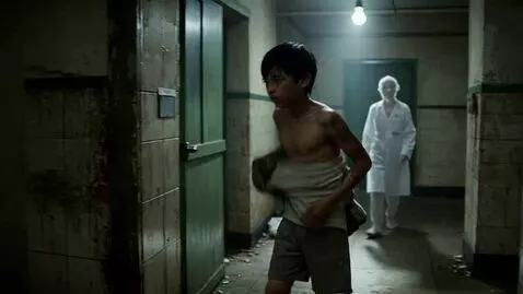 AI Video from prompt: A nine-year-old boy in torn clothes takes a show