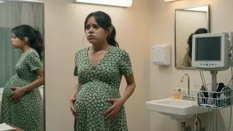 AI Video from prompt: A very bloated American woman is in a hospital b