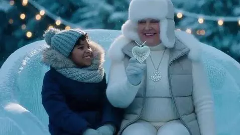 AI Video from prompt: a mature, plump sixty-year-old snow queen in a s