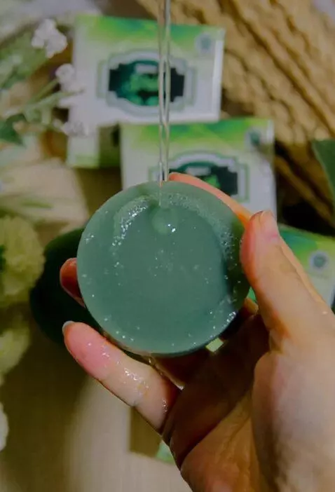 AI Video from prompt: A cinematic close-up of a premium soap bar being