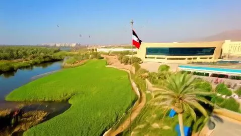 AI Video from prompt: Scene 2 The Nile River flows peacefully through 