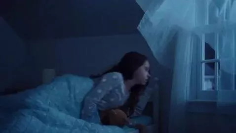AI Video from prompt: A little girl is sleeping in her room. She wakes