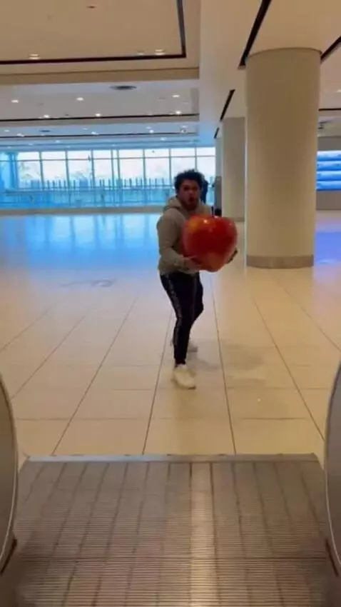 AI Video from prompt: In the first person. Standing on the escalator, 