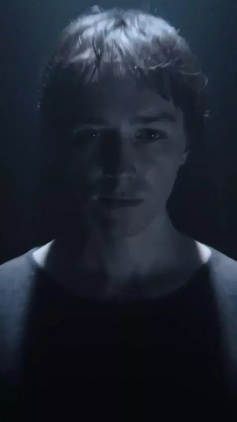 AI Video from prompt: A lonely human figure stands motionless in an en