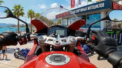 AI Video from prompt: Take one of these motorcycles along the waterfro