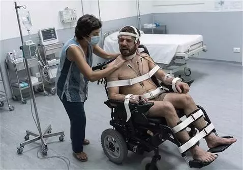 AI Video from prompt: Have the nurse wheel him out while saying "you h