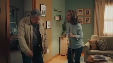 AI Video from prompt: Setting: Living room of Armando and Leticia’s ho
