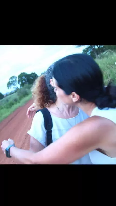 AI Video from prompt: The woman hugs an old female friend