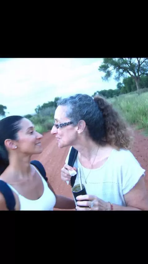 AI Video from prompt: The woman kisses a woman of the same age