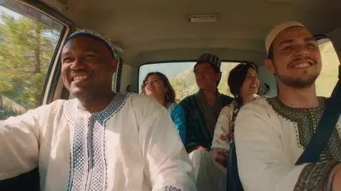 AI Video from prompt: "Mike Tyson is riding in an old Tico car with a 