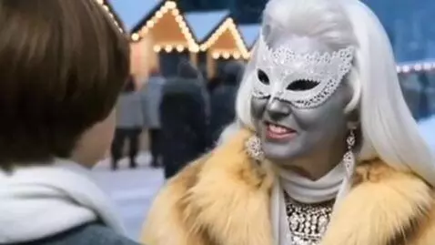 AI Video from prompt: a mature, plump sixty-year-old snow queen with a