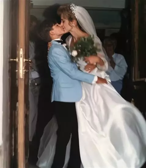 AI Video from prompt: A young dark-haired smiled boy-husband with a we