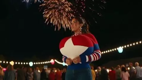 AI Video from prompt: a Latina dressed up to celebrate the fourth of j