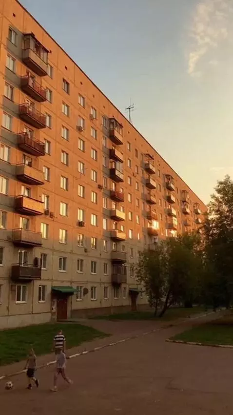 AI Video from prompt: A cinematic slow dolly-in toward a Soviet nine-s