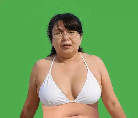 AI Video from prompt: She takes a slow, deep breath.