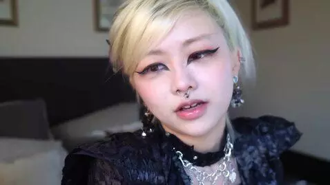 AI Video from prompt: Blond hair blue eyed goth girl