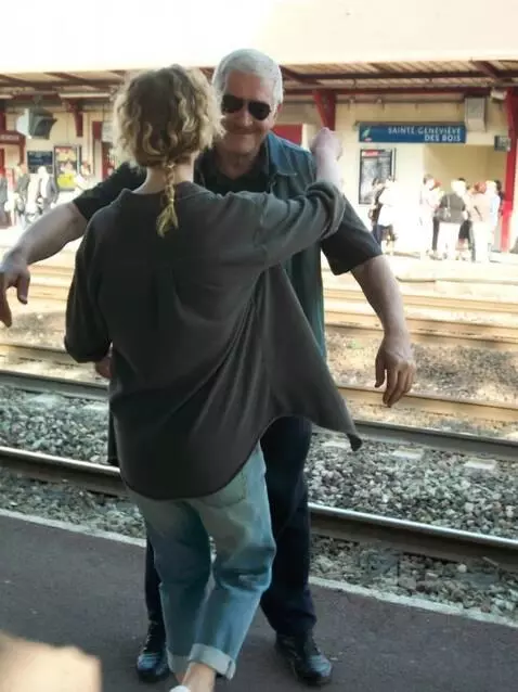 AI Video from prompt: A man is embracing a beautiful young woman with 