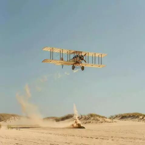 AI Video from prompt: Poetic slow-motion shot of the Wright Flyer I so