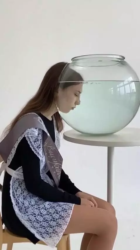 AI Video from prompt: The background changes and the girl is sitting s
